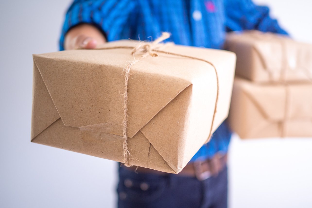 Parcel Box Delivered by a Man